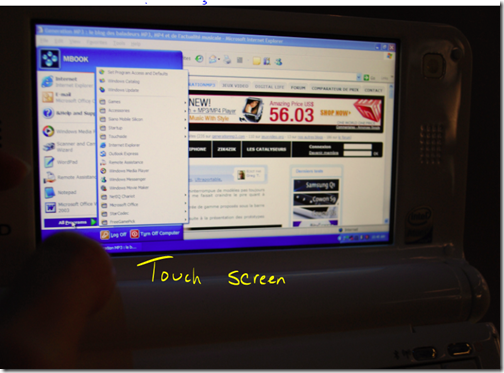 UMID M1 running Windows XP Home. Touch screen allows you to navigate with fingertip.